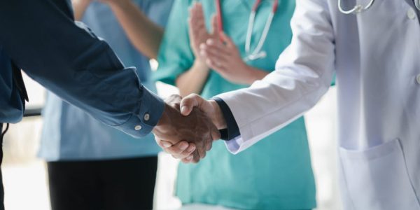handshake at an office