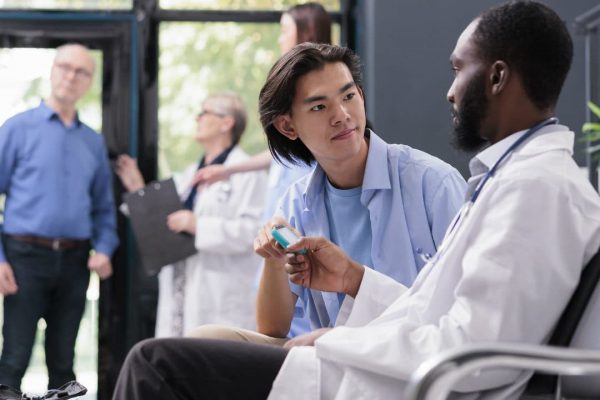 Doctor and patient discussing together
